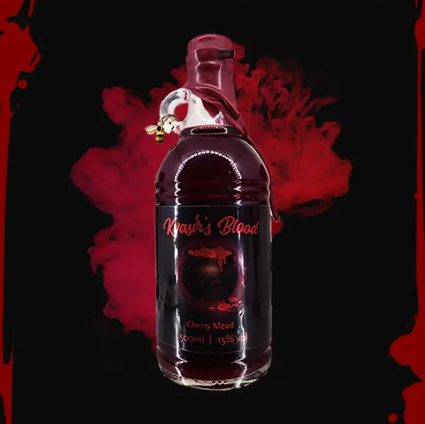 A 500ml bottle of Kvasir's Blood, with an included bee charm attached.
