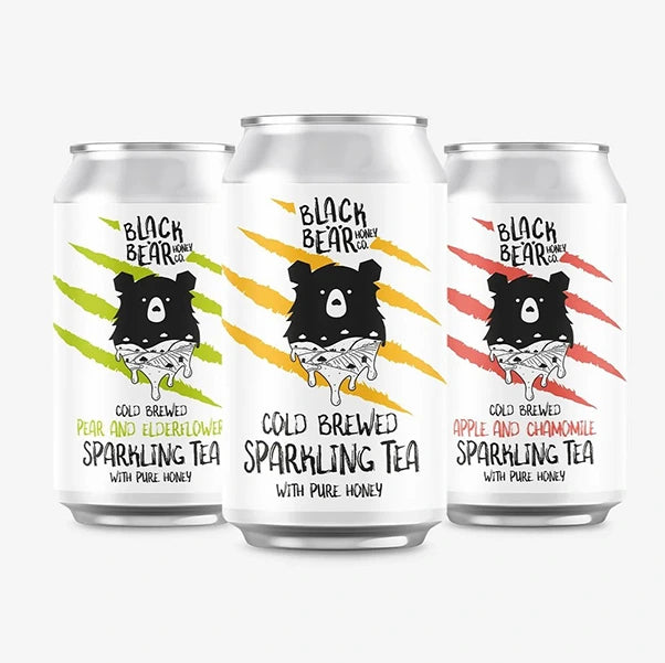 Three cans of Black Bear Honey Co.'s sparkling tea. Just Honey, Pear and Elderflower, and Apple and Chamomile.