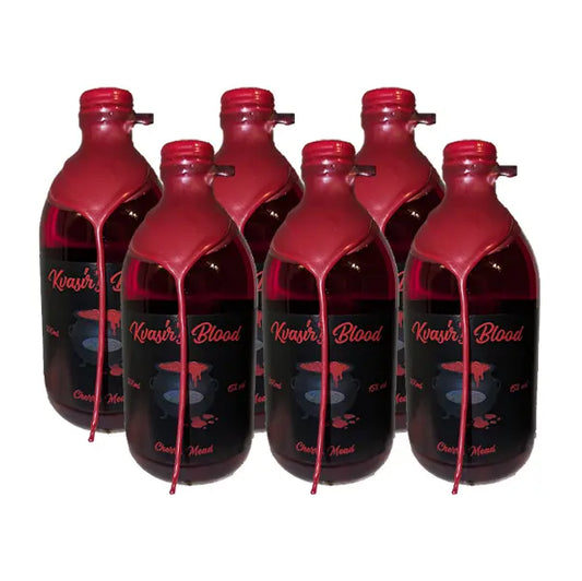 Six bottles of Kvasir Blood on a white background