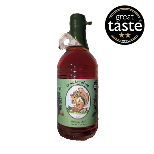 A bottle of Bramblewood Sap blackberry mead with a green cap and label, shown on a white background with a 'great taste 2025' badge in the top right corner.